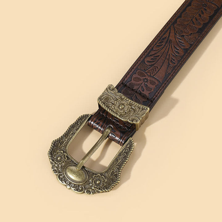 Cinturón de cuero con hebilla tallada en bronce y estampado floral bohemio