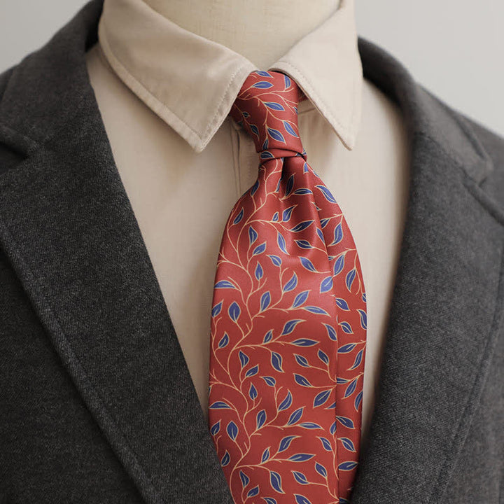 Corbata para hombre con estampado floral de hojas en rojo oscuro y azul marino