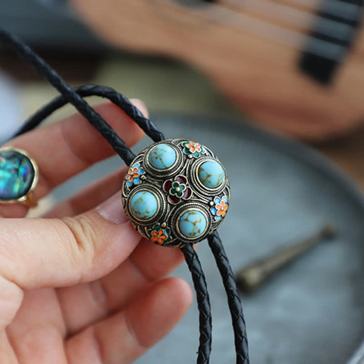 Corbata de bolo con flores esmaltadas en turquesa azul antiguo