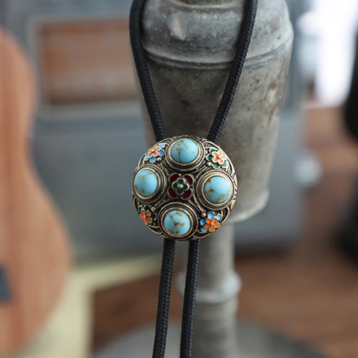 Corbata de bolo con flores esmaltadas en turquesa azul antiguo