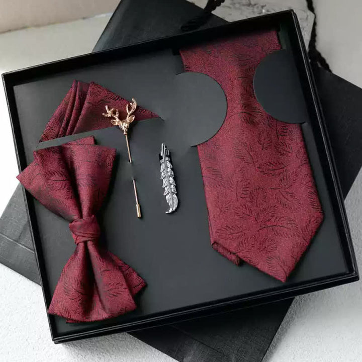 Caja de regalo con 5 pajaritas informales con estampado de hojas en marrón oscuro para hombre