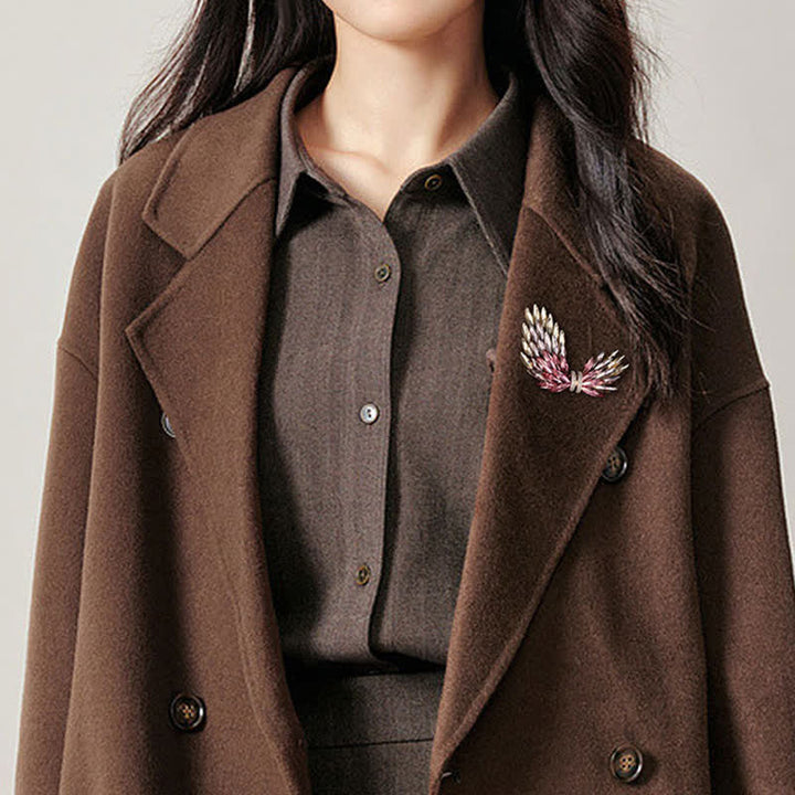 Broche de lujo elegante con alas de circonita brillante para mujer