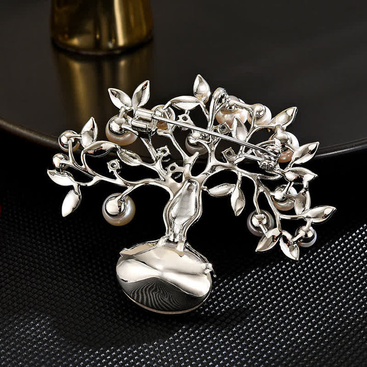 Broche elegante retro con forma de flor del árbol de la vida para mujer
