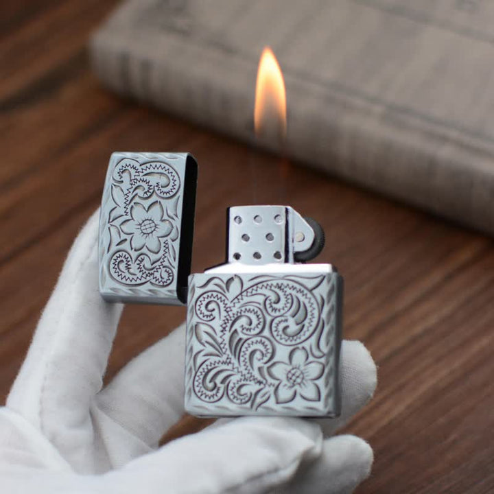 Encendedor de butano recargable con elegante diseño de flores en relieve