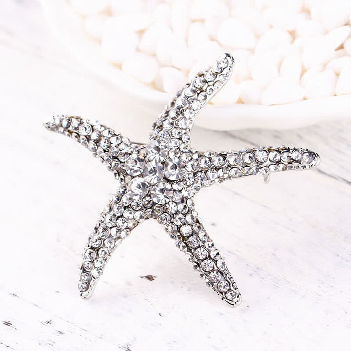 Broche de estrella de mar brillante con diamantes de imitación para mujer