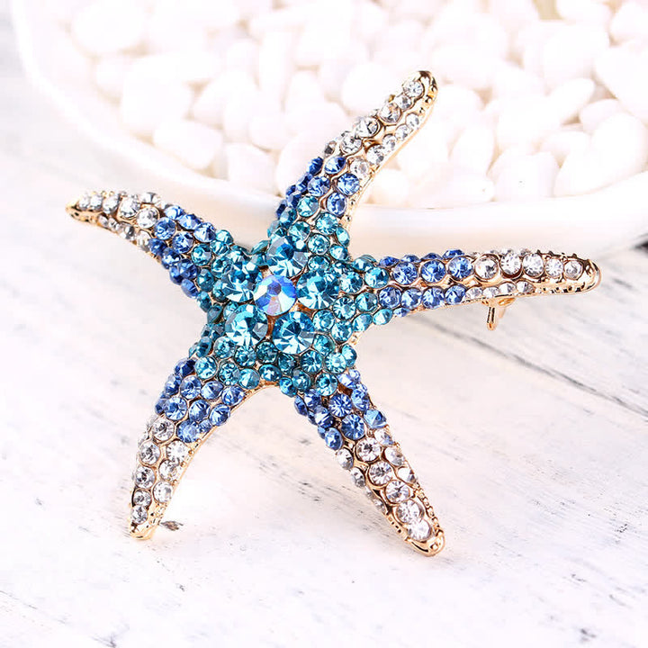 Broche de estrella de mar brillante con diamantes de imitación para mujer