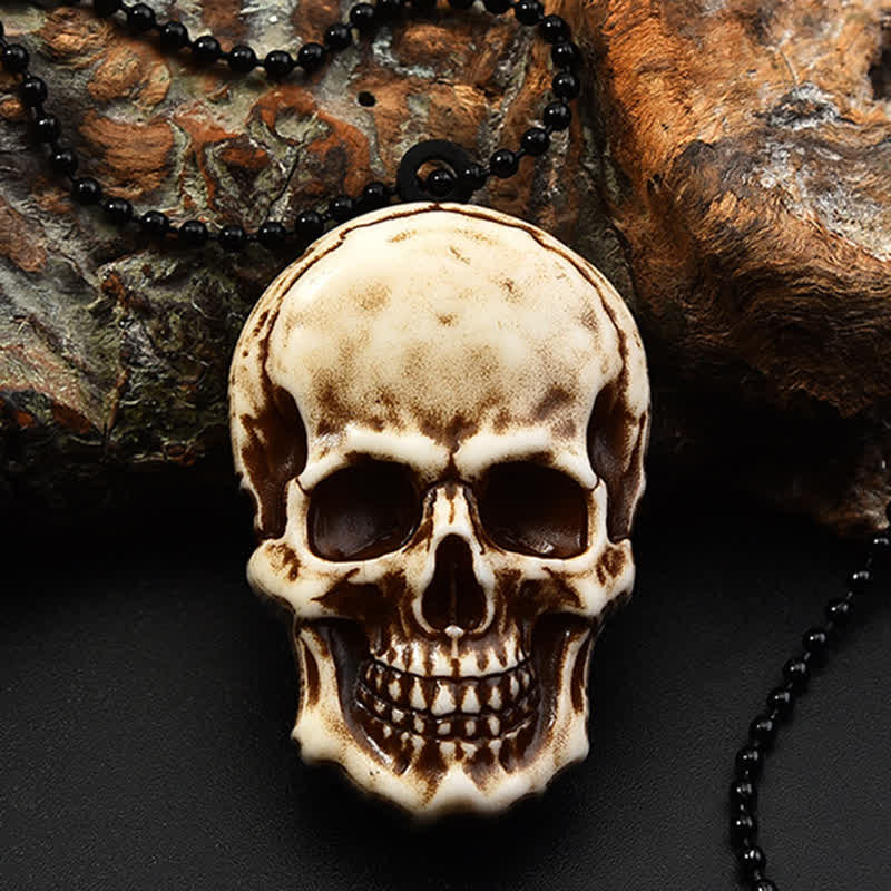 Mini cuchillo plegable con diseño de calavera creativa y llavero con cadena.