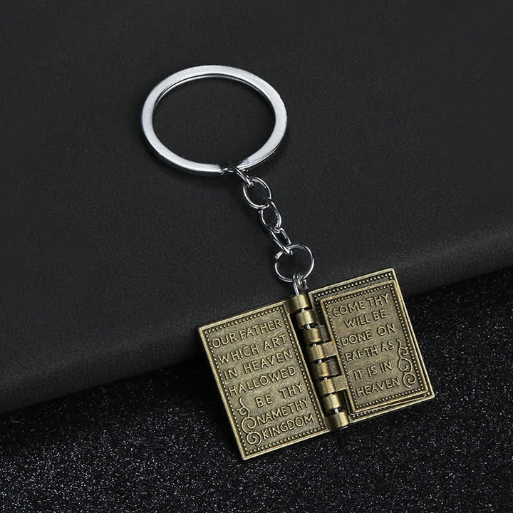 Llavero con colgante de libro de páginas volteables de la Biblia retro