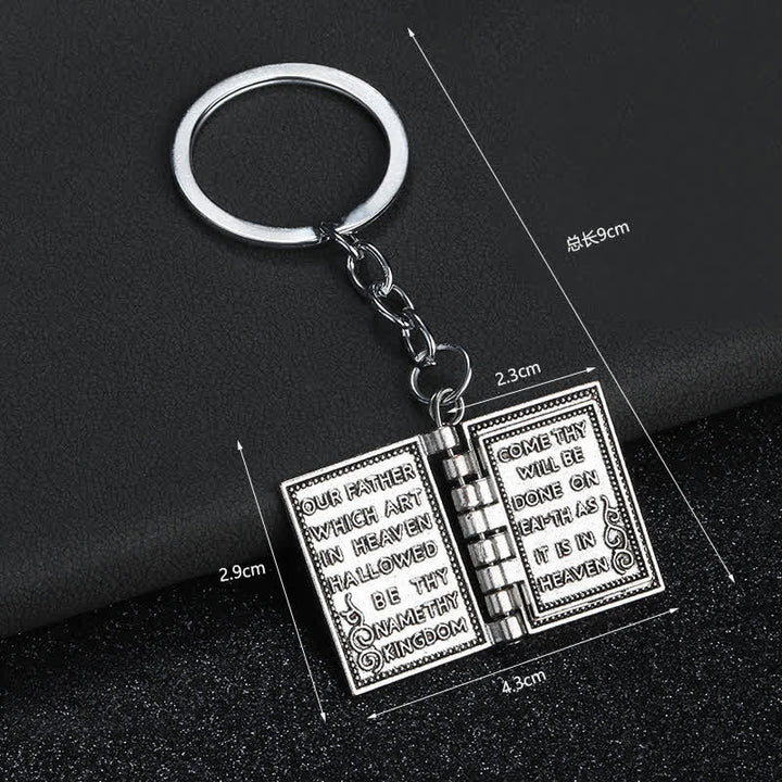 Llavero con colgante de libro de páginas volteables de la Biblia retro