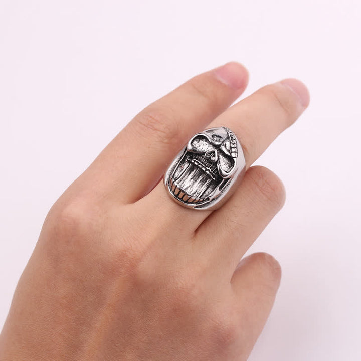 Anillo abridor de botellas con forma de calavera sonriente gótica