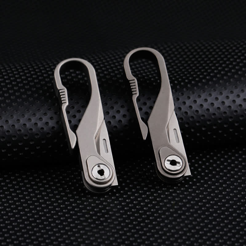 Mini navaja plegable de titanio con llavero y cortador de cajas