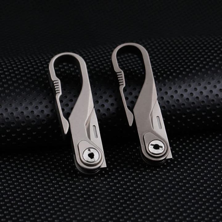 Mini navaja plegable de titanio con llavero y cortador de cajas