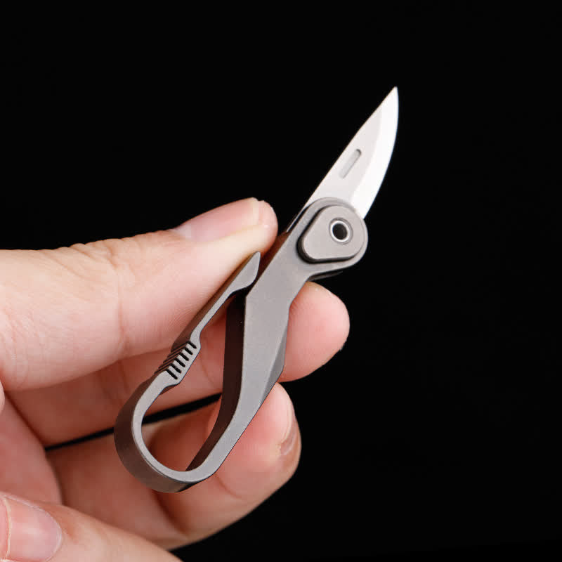 Mini navaja plegable de titanio con llavero y cortador de cajas