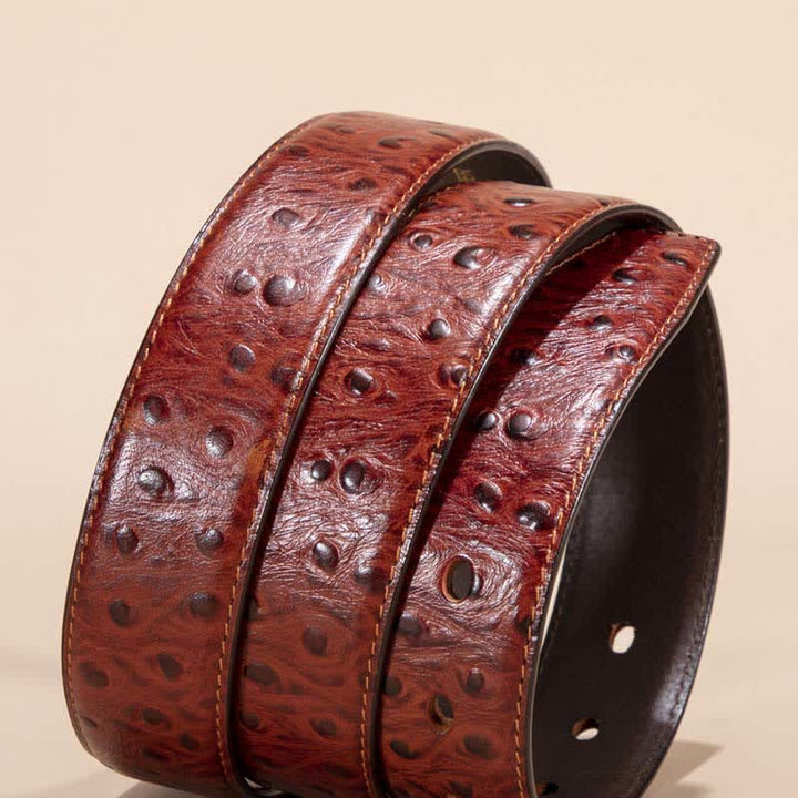 Cinturón de piel de caimán con estampado de cocodrilo exótico.