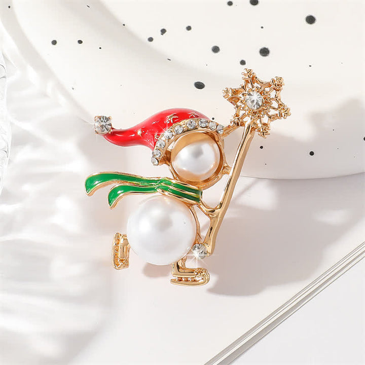 Broche navideño con gorro de Papá Noel rojo y muñeco de nieve para mujer