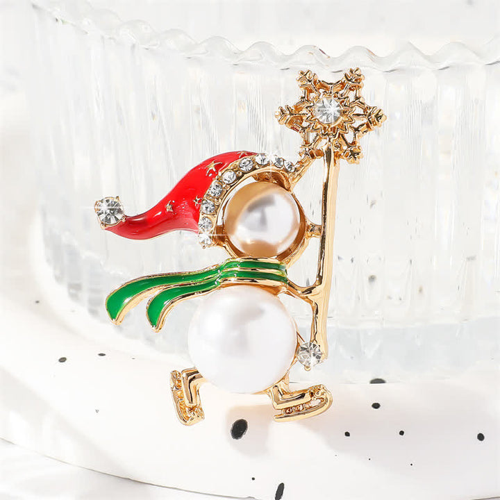 Broche navideño con gorro de Papá Noel rojo y muñeco de nieve para mujer