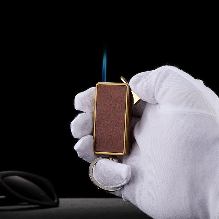 Encendedor de butano recargable con cuerpo de cuero y llavero portátil