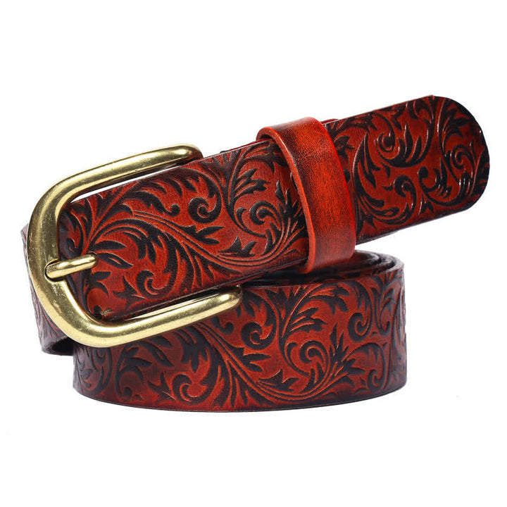 Cinturón clásico de cuero con un hermoso relieve floral.