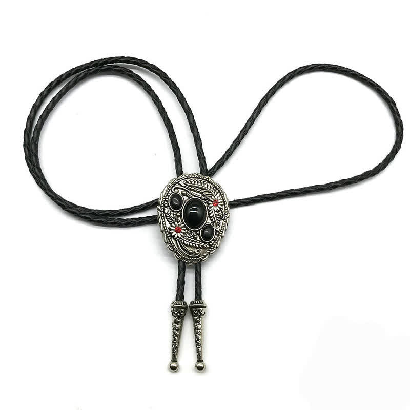 Corbata de bolo con incrustaciones de tres piedras y flores talladas
