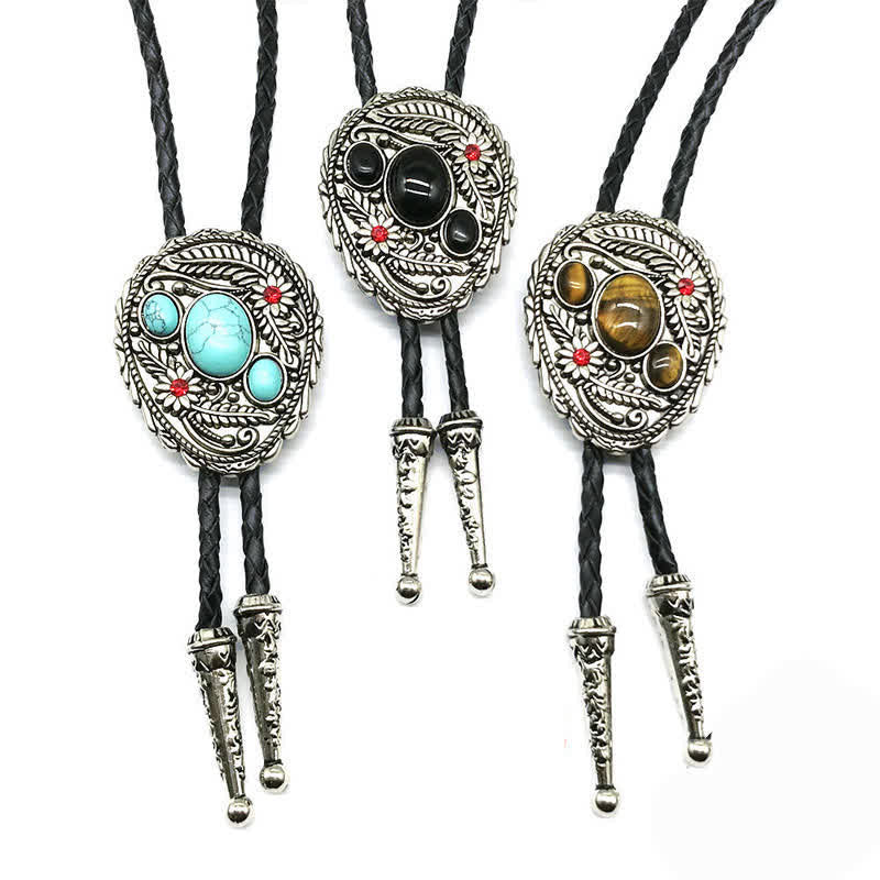 Corbata de bolo con incrustaciones de tres piedras y flores talladas