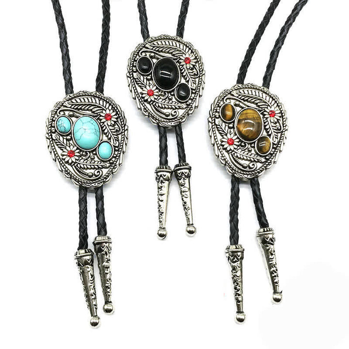 Corbata de bolo con incrustaciones de tres piedras y flores talladas
