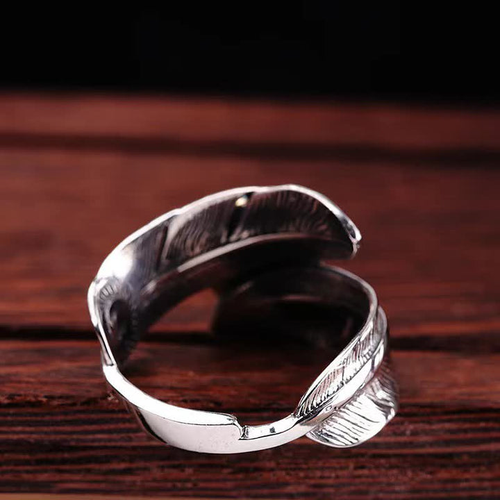 Anillo abierto ajustable con plumas turquesas para hombre