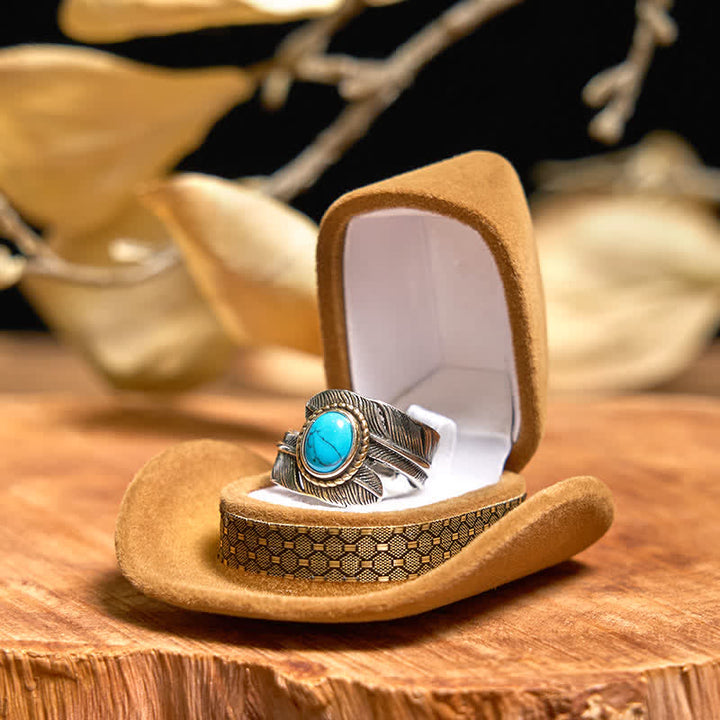 Conjunto de collar y anillo con pluma turquesa y hebilla de cinturón con cuchillo oculto de alas angulares
