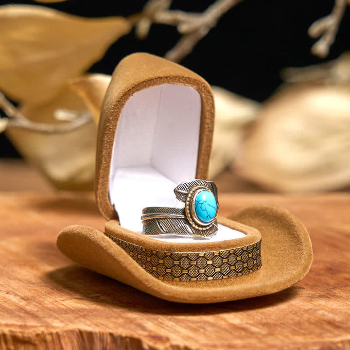 Conjunto de collar y anillo con pluma turquesa y hebilla de cinturón con cuchillo oculto de alas angulares