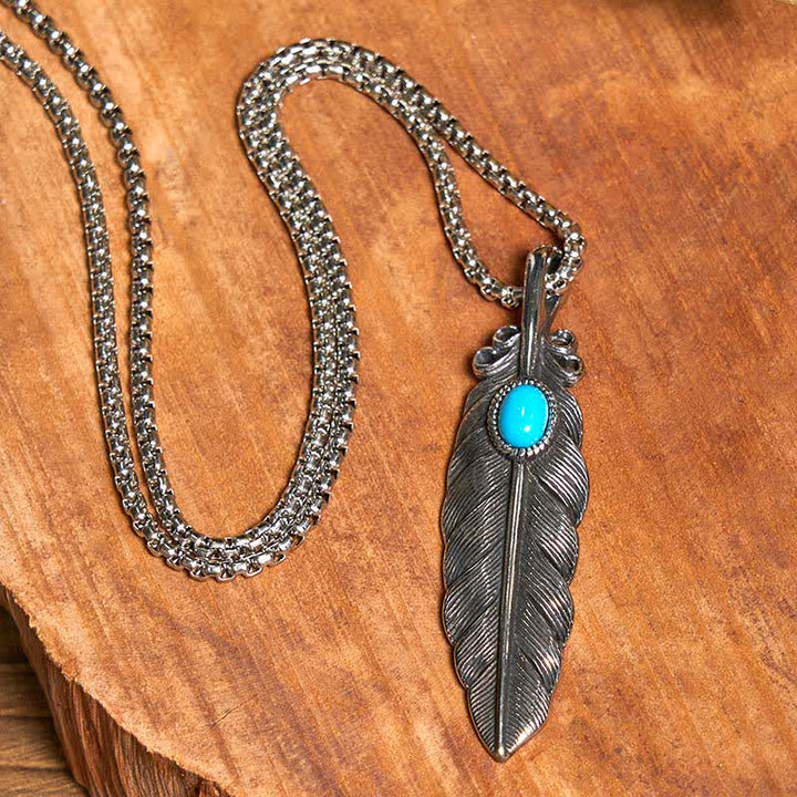 Conjunto de collar y anillo con pluma turquesa y hebilla de cinturón con cuchillo oculto de alas angulares