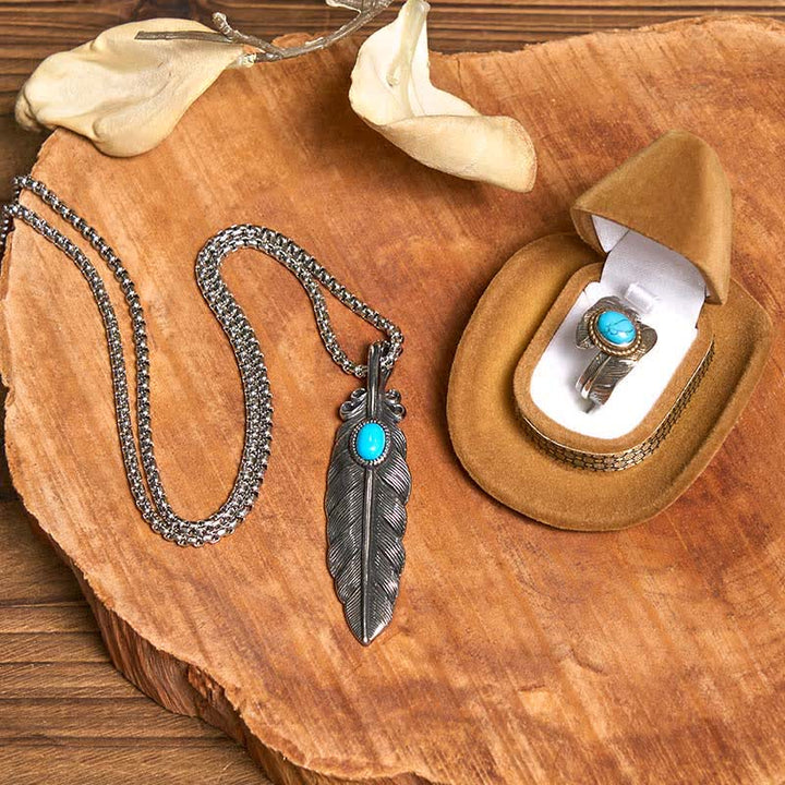Conjunto de collar y anillo con pluma turquesa y hebilla de cinturón con cuchillo oculto de alas angulares