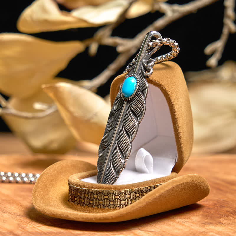 Conjunto de collar y anillo con pluma turquesa y hebilla de cinturón con cuchillo oculto de alas angulares