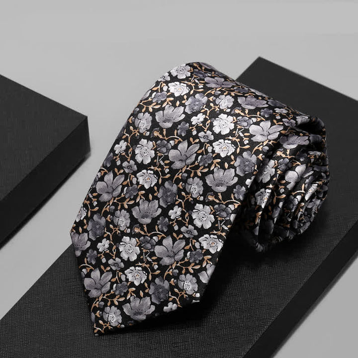 Corbata de seda pura con estampado floral pequeño en gris y negro para hombre
