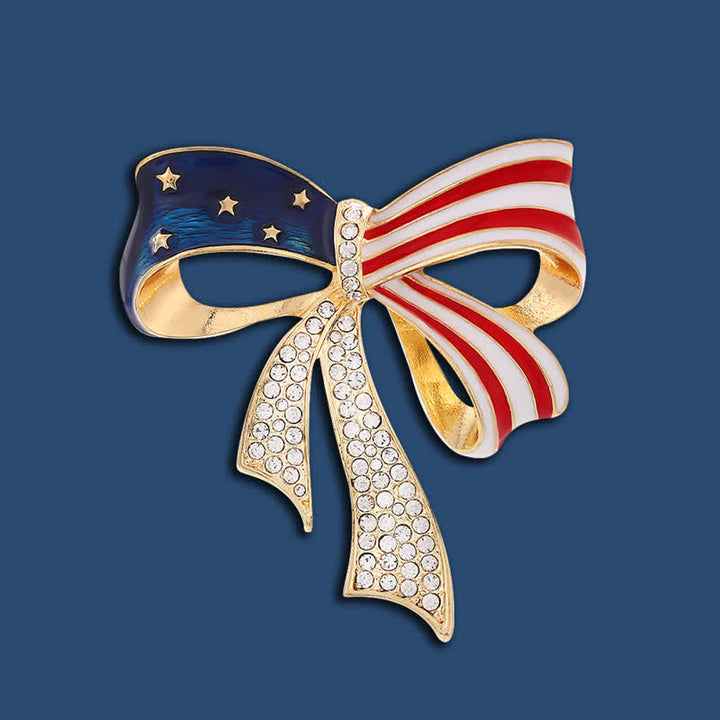 Broche de diamantes de imitación con nudo de lazo y bandera estadounidense