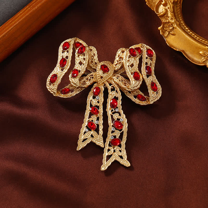 Broche de lazo de cinta metálica ondulada dorada elegante para mujer