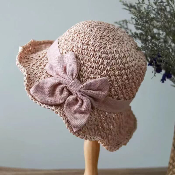 Sombrero de paja plegable para el sol con nudo de lazo para playa