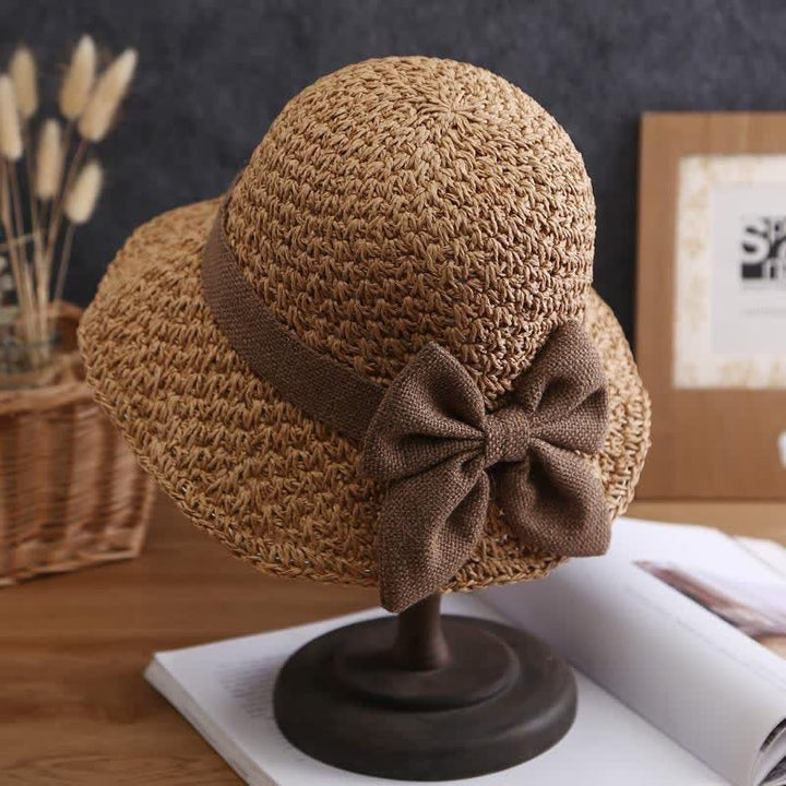 Sombrero de paja plegable para el sol con nudo de lazo para playa