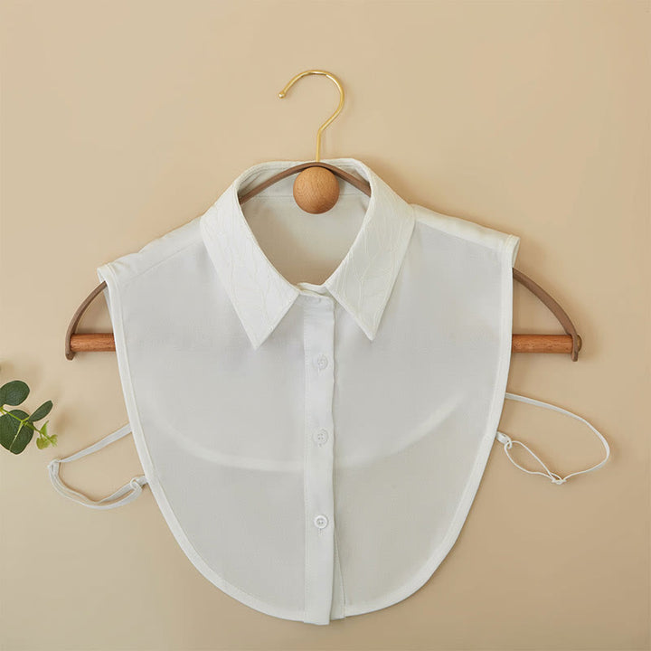 Blusa camisera desmontable con cuello falso y flores bordadas