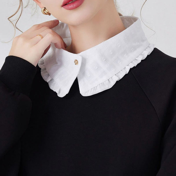 Blusa camisera desmontable con cuello falso y entramado de pétalos
