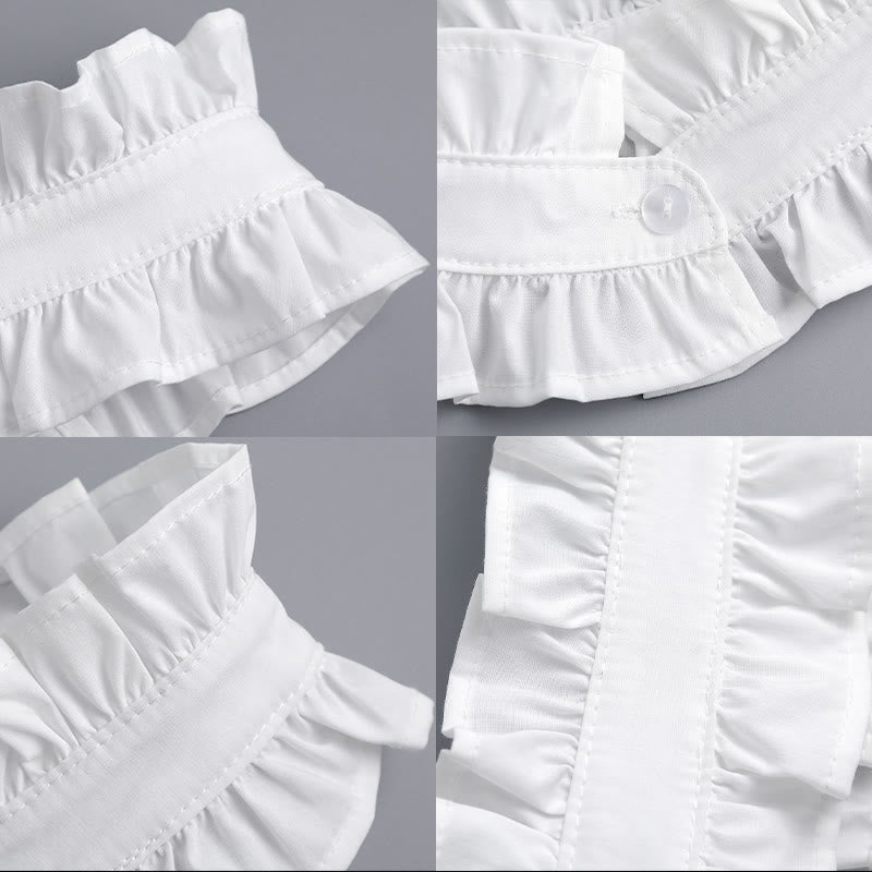 Camisa blanca con cuello plisado y botón desprendible