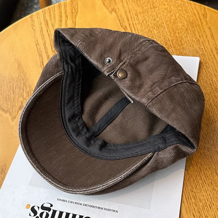 Gorra plana estilo vendedor de periódicos de mezclilla lavada a la moda