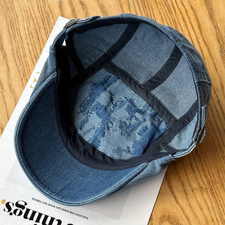 Gorra plana estilo vendedor de periódicos de mezclilla lavada y rasgada