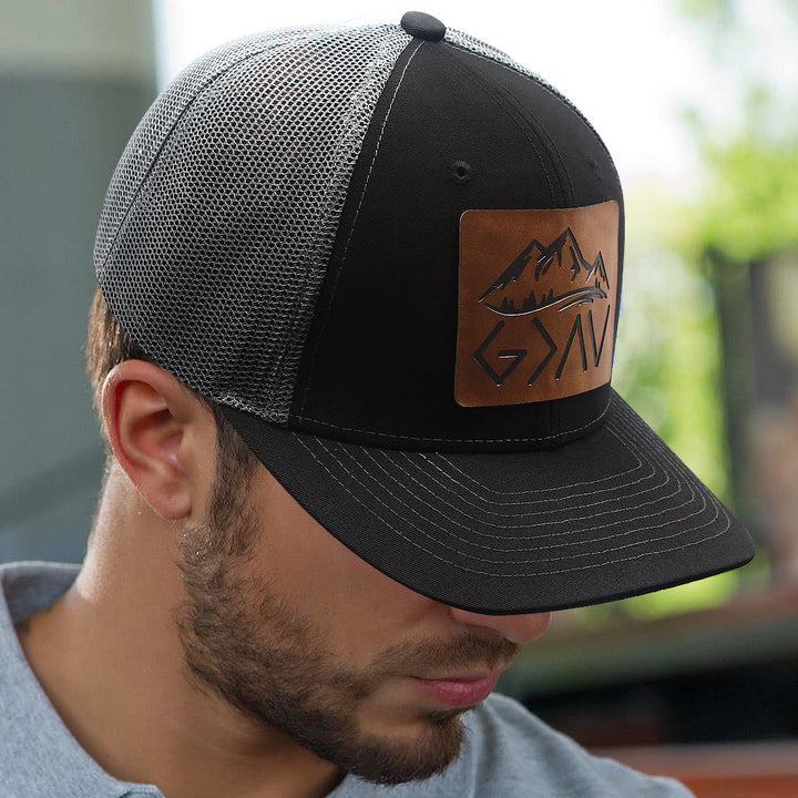 Gorra de camionero ajustable "Dios es más grande que los altibajos"