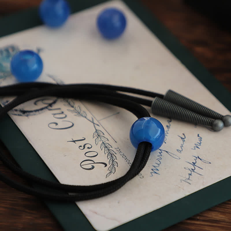 Colgante de ágata azul redondo sencillo hecho a mano con lazo bolo