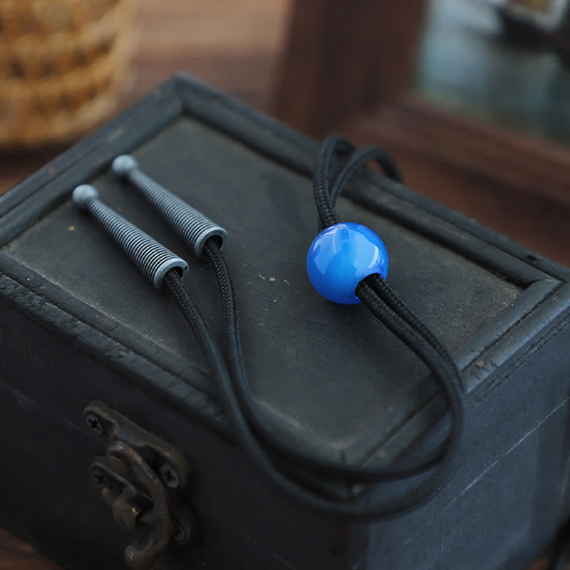 Colgante de ágata azul redondo sencillo hecho a mano con lazo bolo