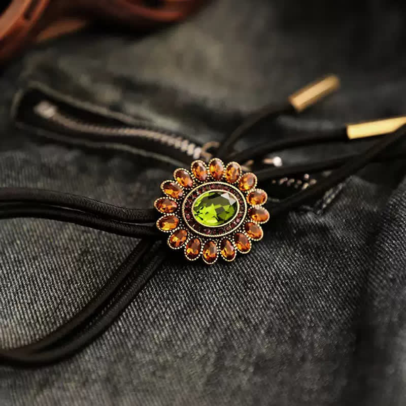 Corbata bolo con flor de cristal verde y naranja solar
