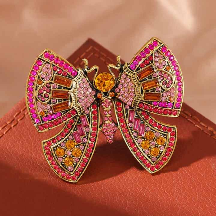 Broche de mariposa con cristales de imitación para mujer