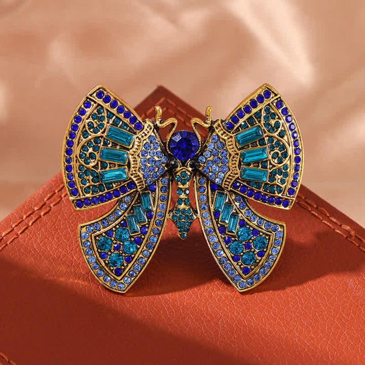 Broche de mariposa con cristales de imitación para mujer