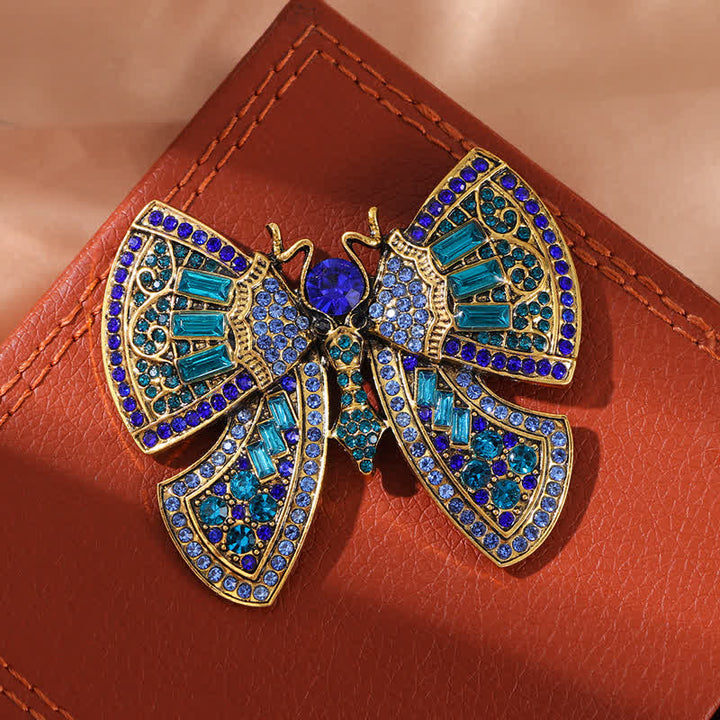 Broche de mariposa con cristales de imitación para mujer