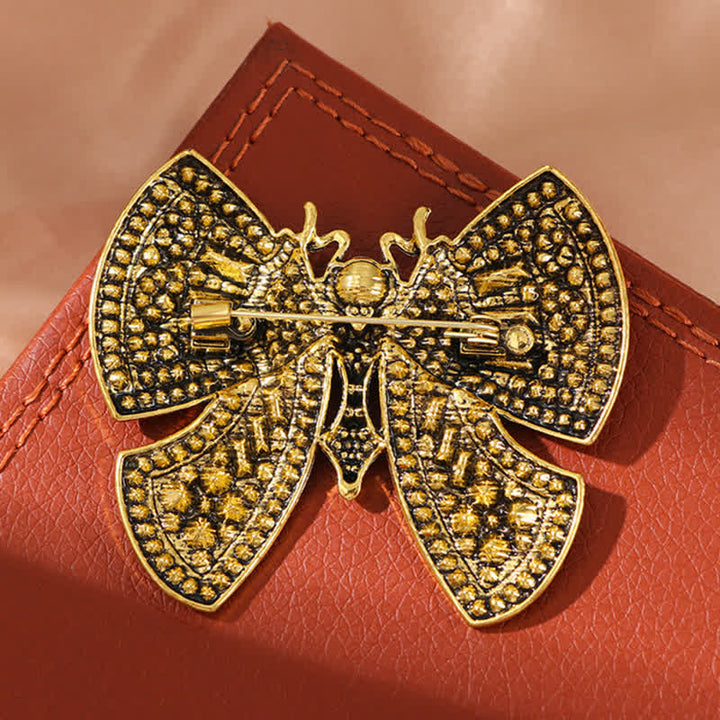 Broche de mariposa con cristales de imitación para mujer