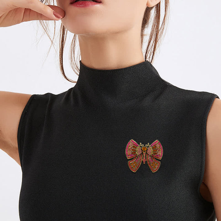 Broche de mariposa con cristales de imitación para mujer